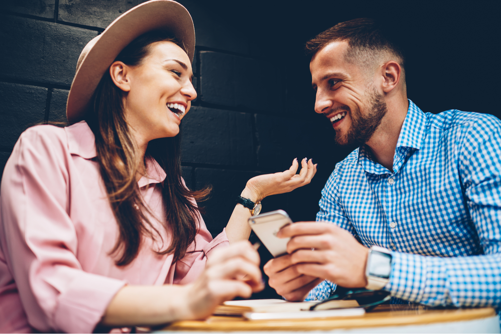 couple laughing at their first date