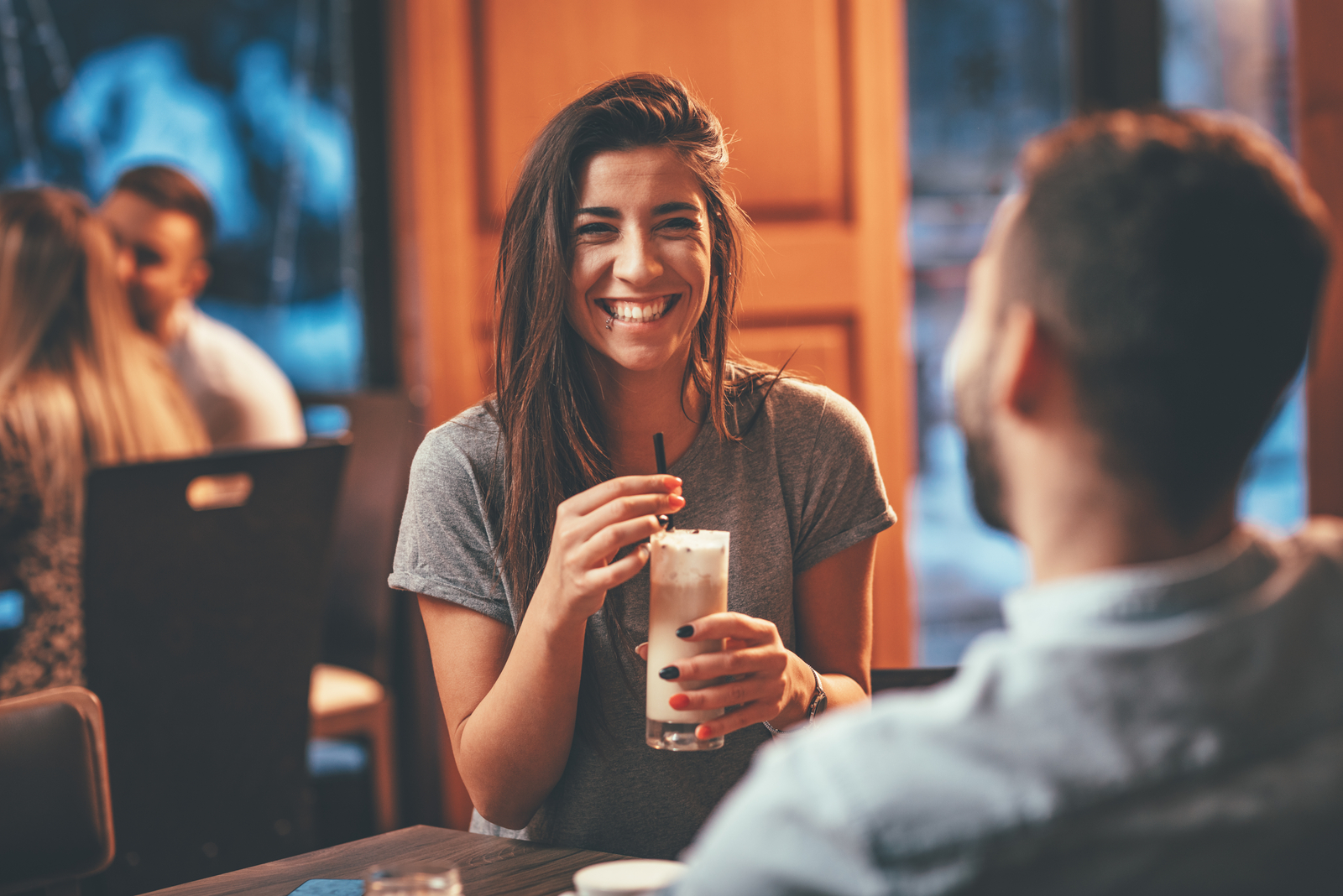 man and woman meeting in bar