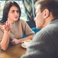 a woman quarrels with a man