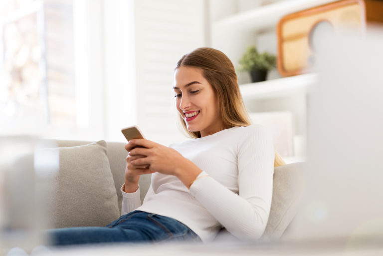 happy woman texting