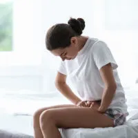 woman having menstrual cramps