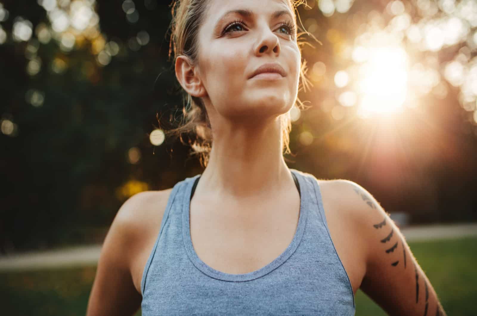 confident woman in athletic clothes