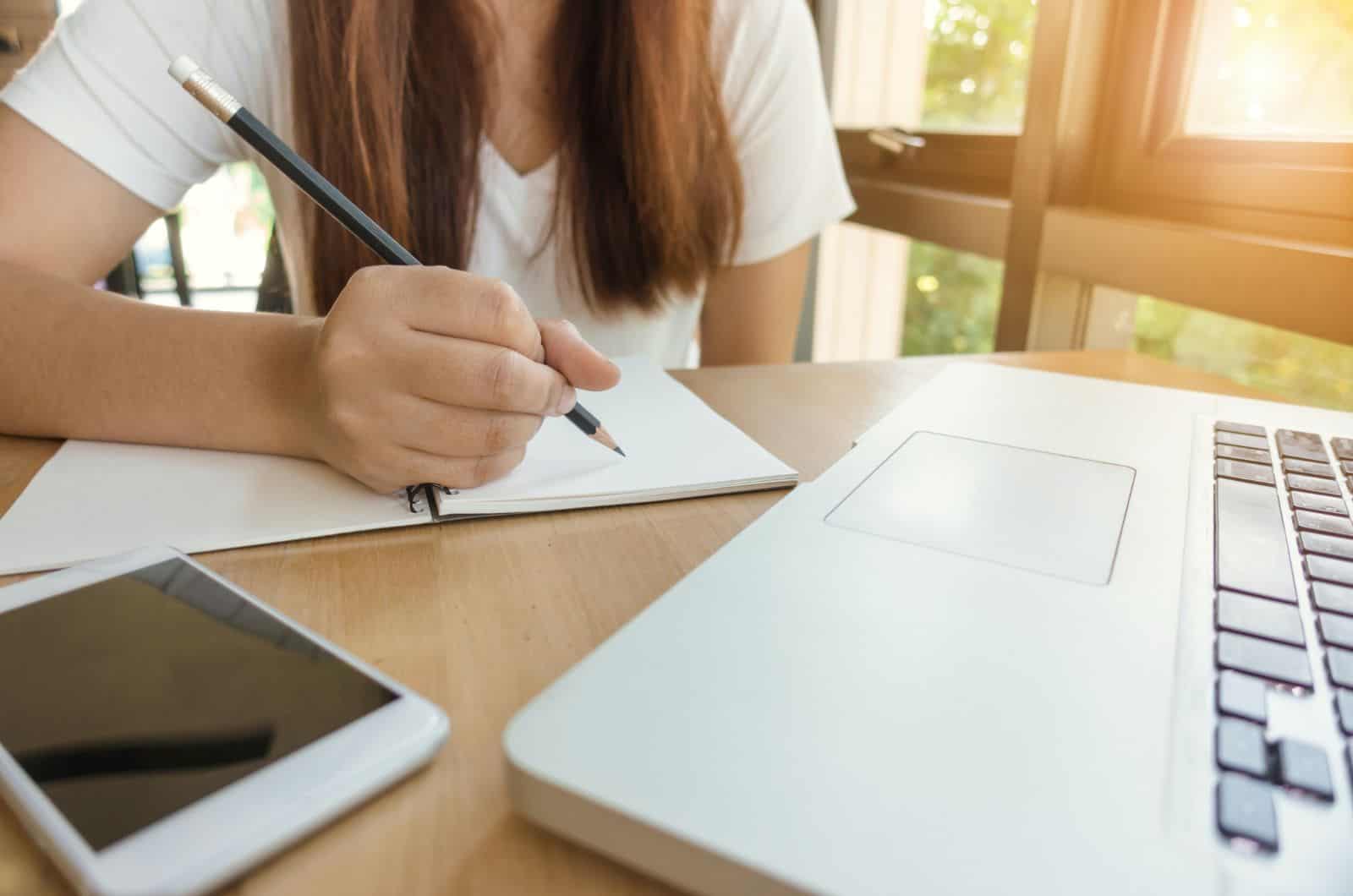 girl writing speech