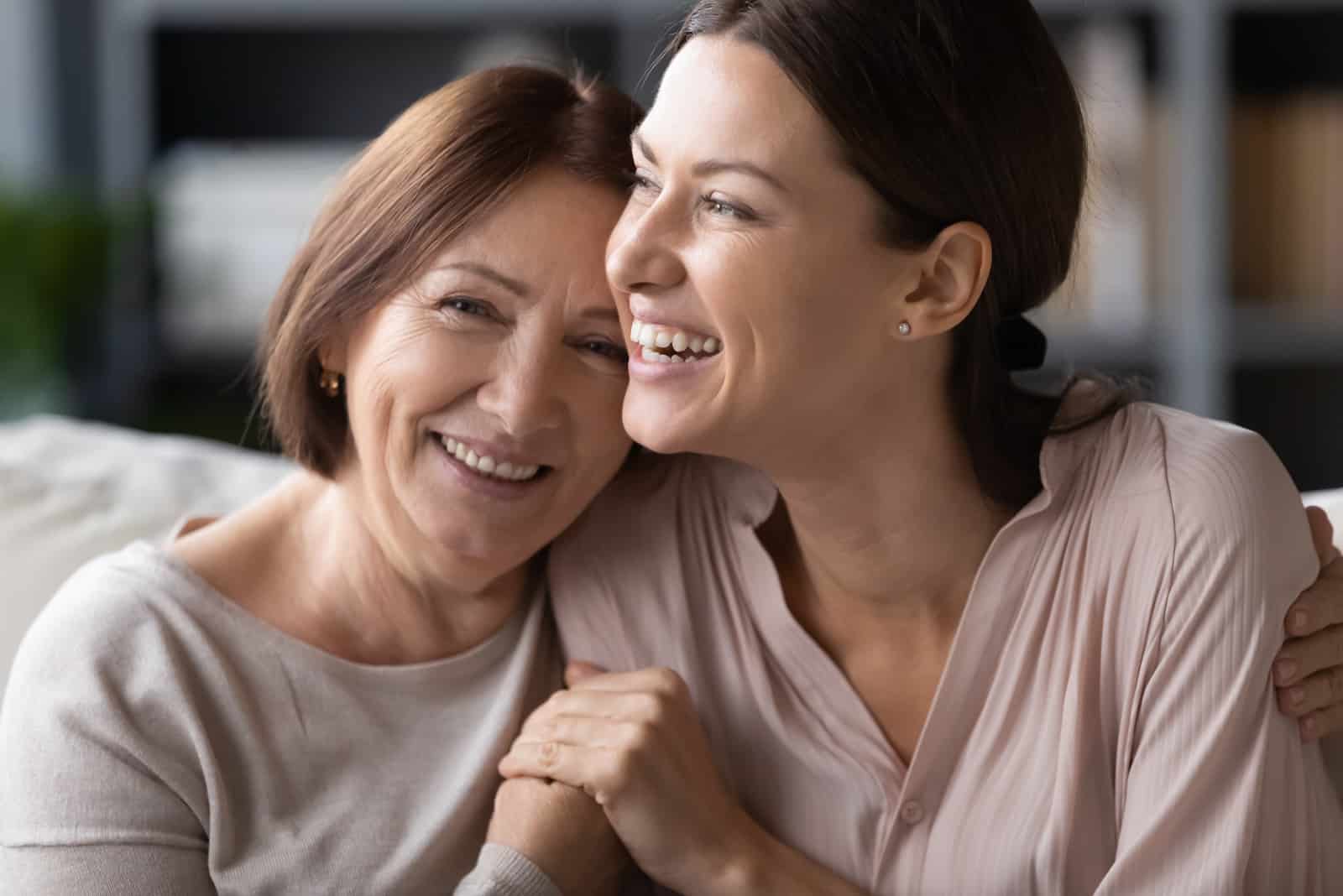 mother and daughter laughing