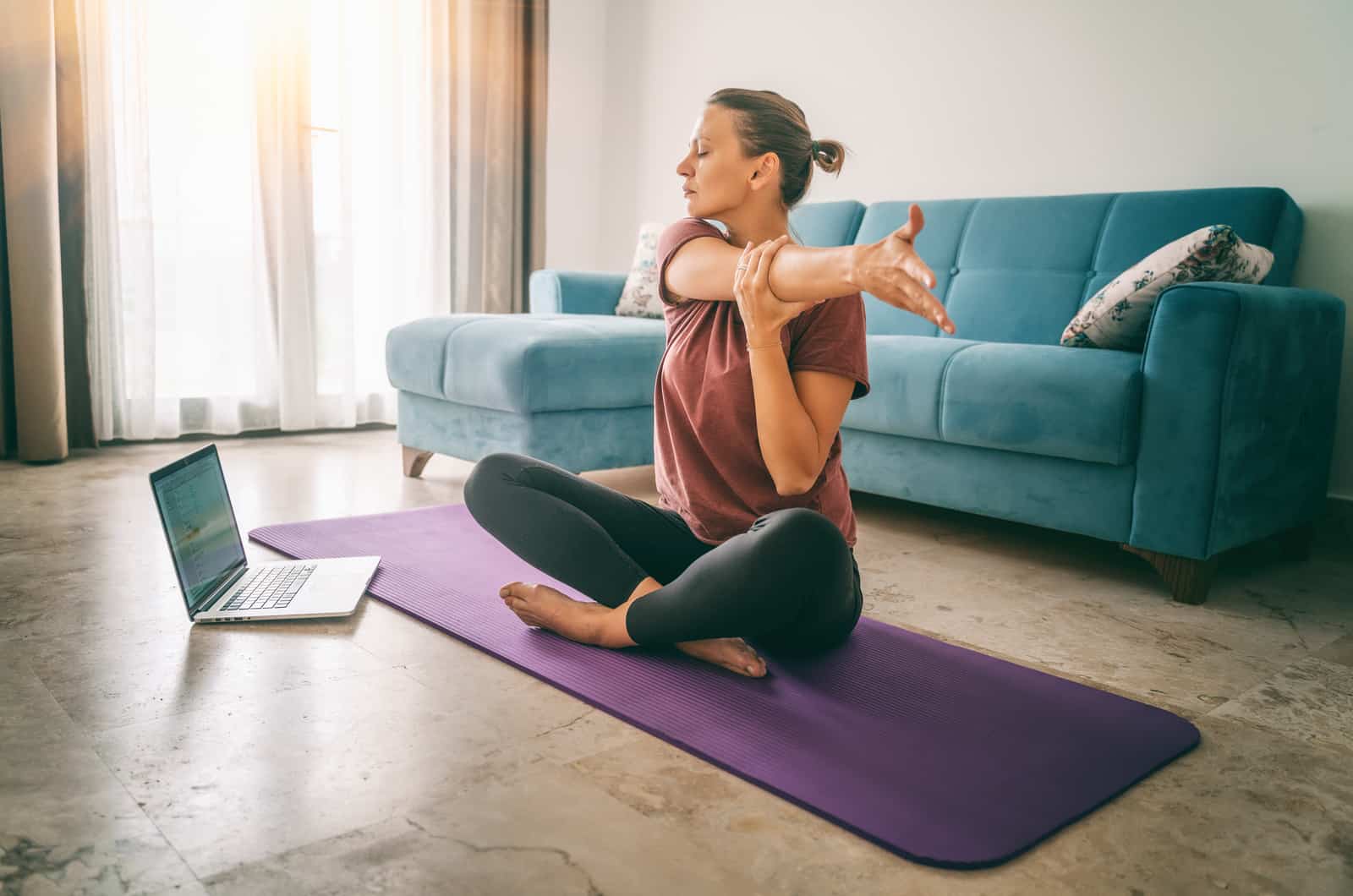 woman practicing yoga