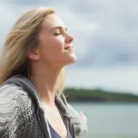 calm woman outdoor breathing