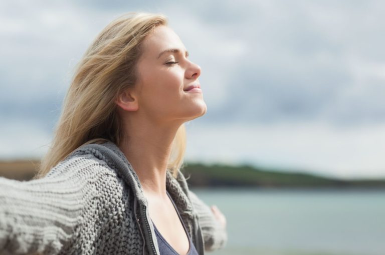 calm woman outdoor breathing