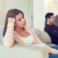 young woman giving her husband the silent treatment