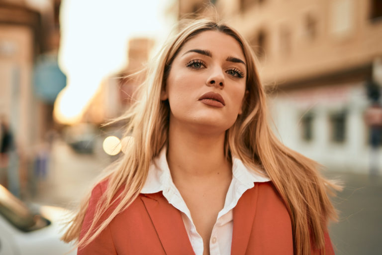 Young blonde businesswoman with serious expresison