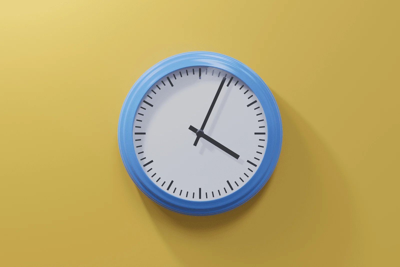 a blue clock on a yellow wall