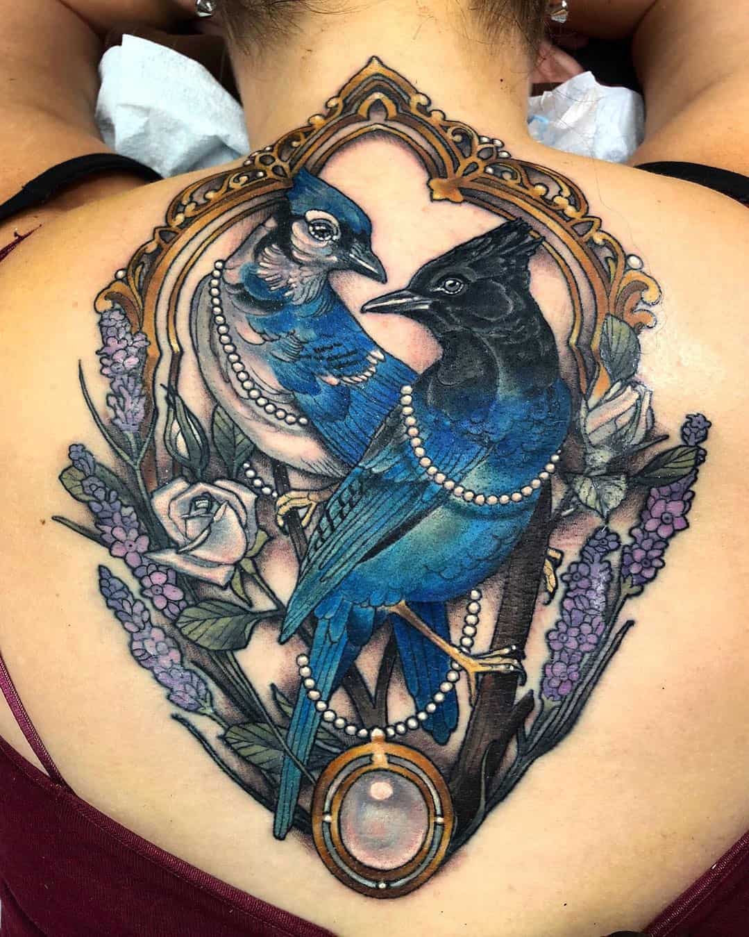 Antique birds tattoo