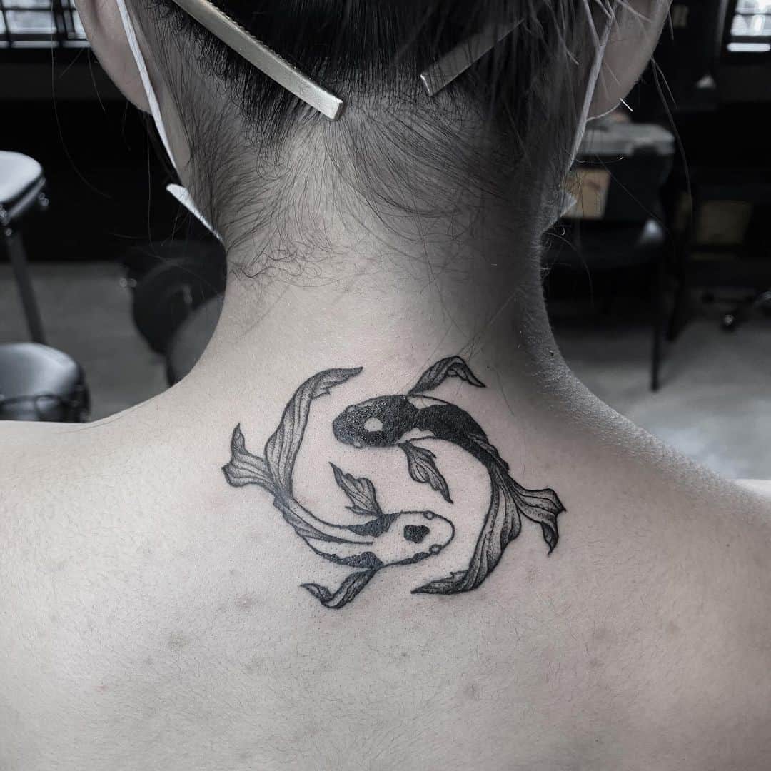 Back of the neck koi fish tattoo