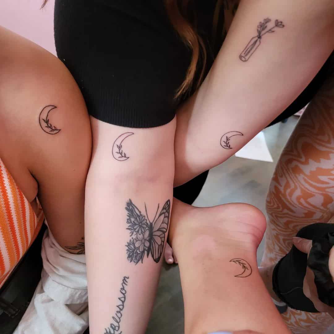 Beautiful matching moon tattoos for group of friends