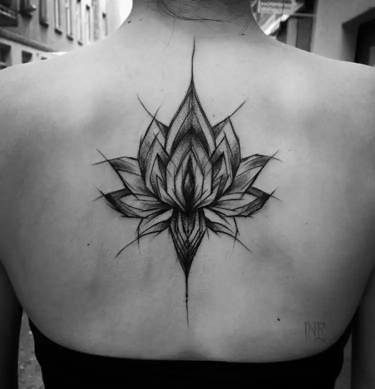 Black and white lotus tattoo