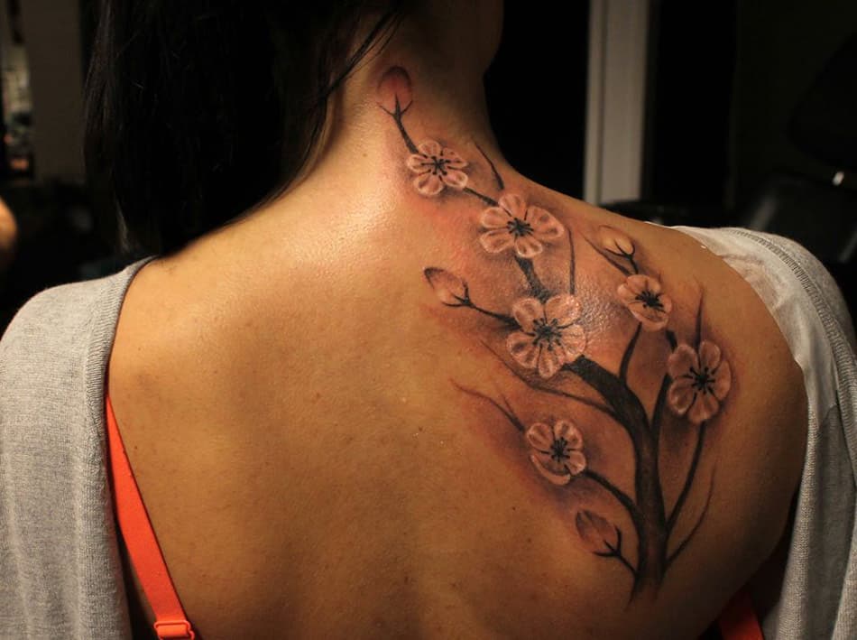Cherry blossom branch tattoo