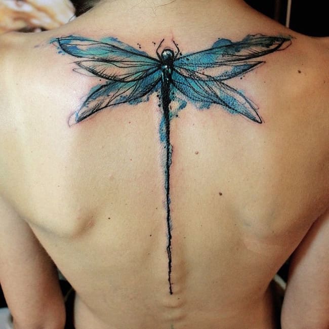 Dragonfly spine tattoo