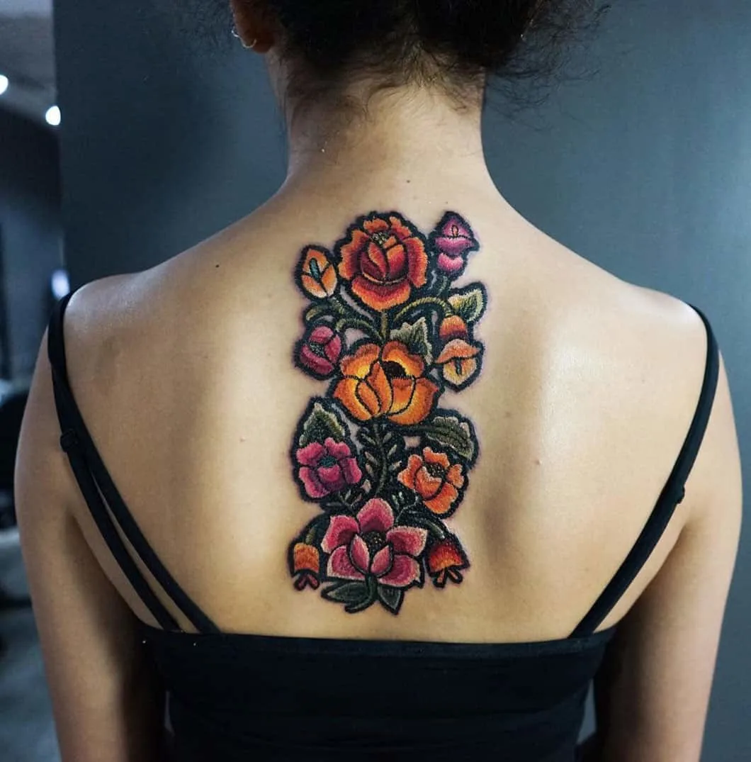 Embroidered flower-back tattoo