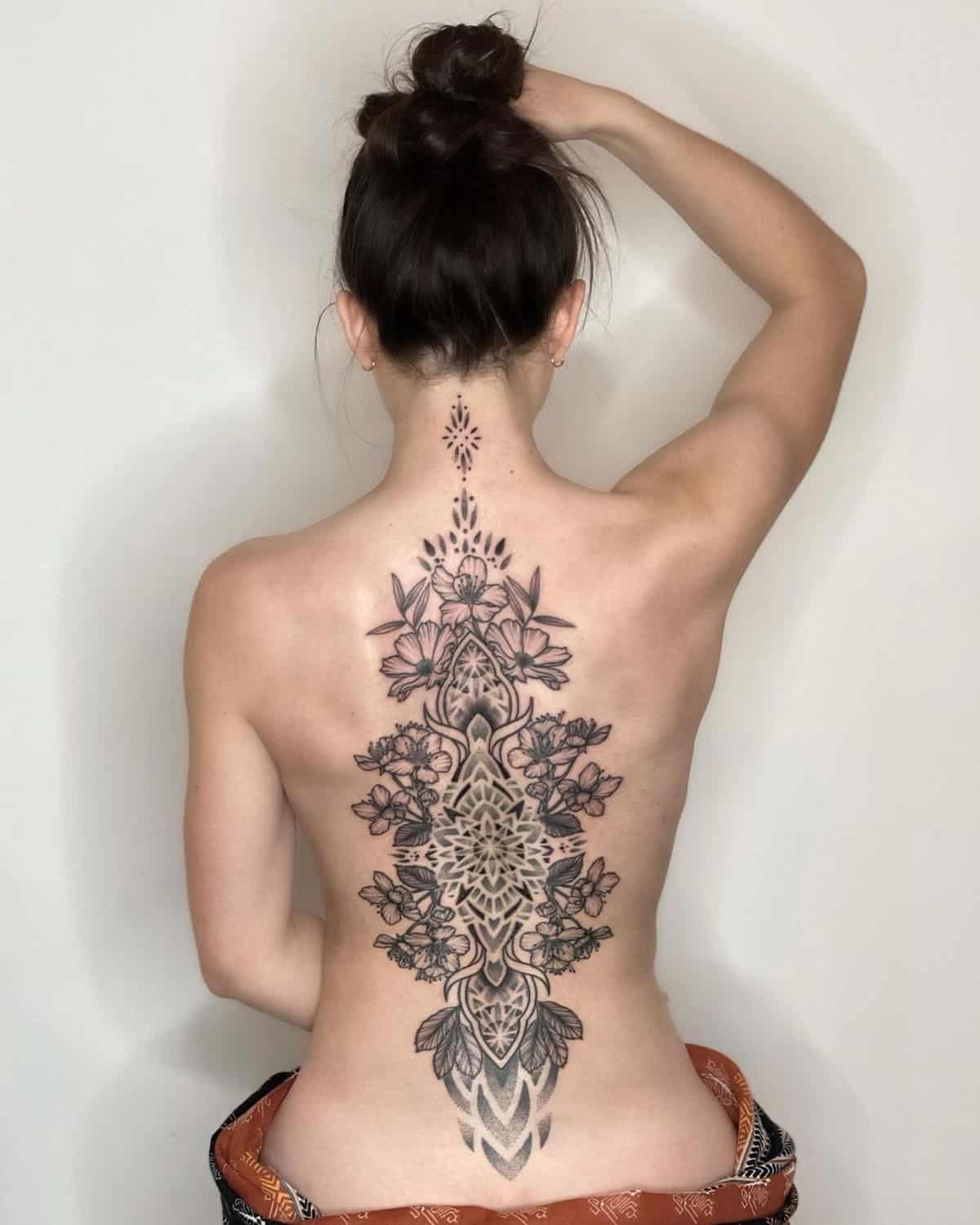 Feminine floral design tattoo