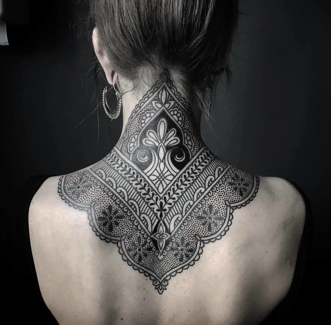 Feminine lace neck tattoo