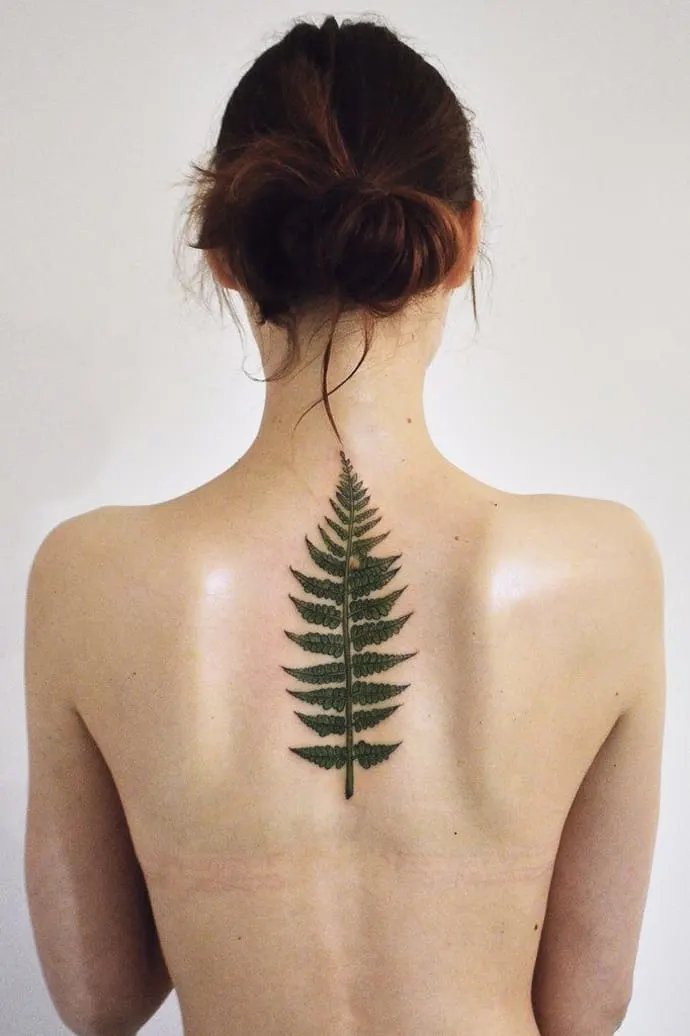 Fern spine tattoo