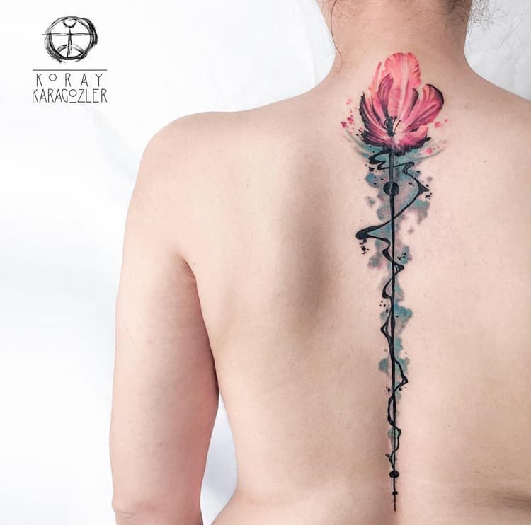 Floral spine tattoo