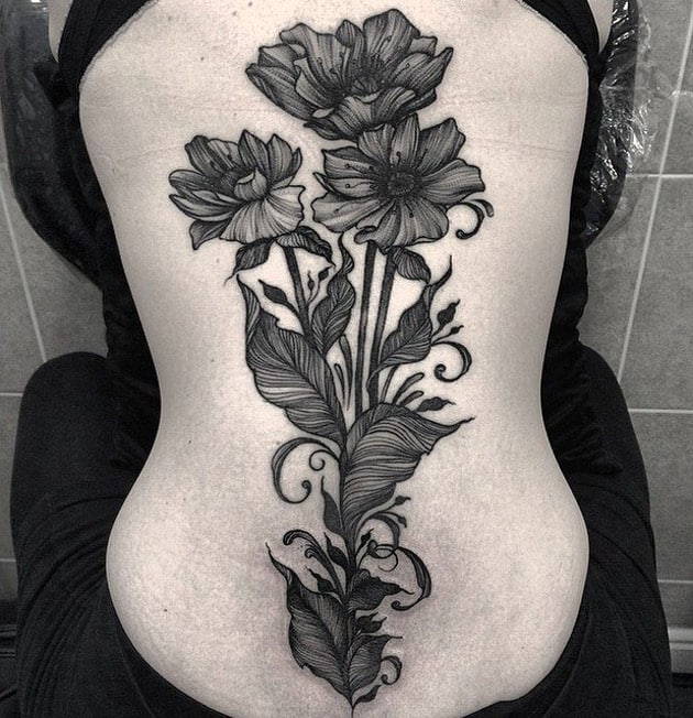 Flowers spine tattoo