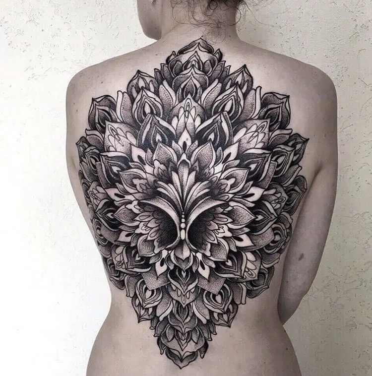 Intricate full-back tattoo