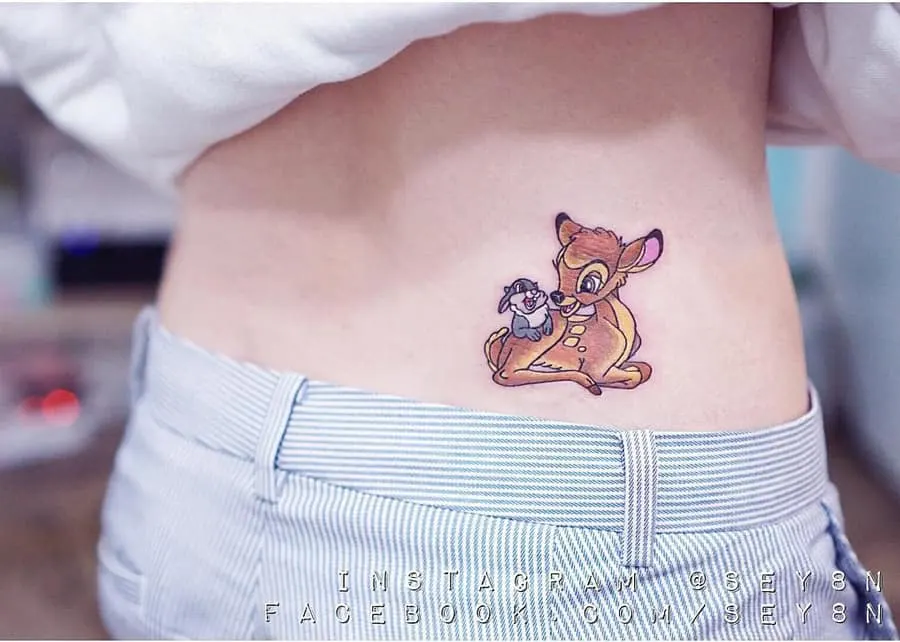Lower-back Bambi tattoo
