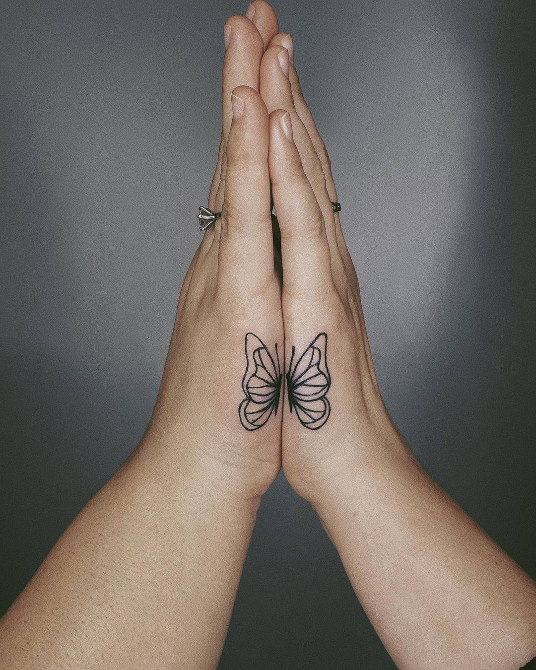 Matching butterfly hand tattoo for BFFs