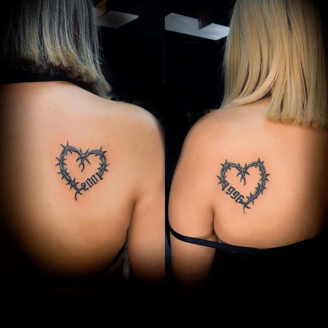 Matching heart sister tattoo