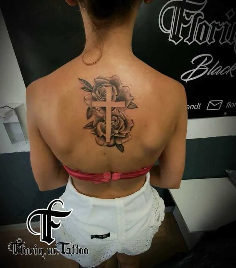 Roses and cross tattoo