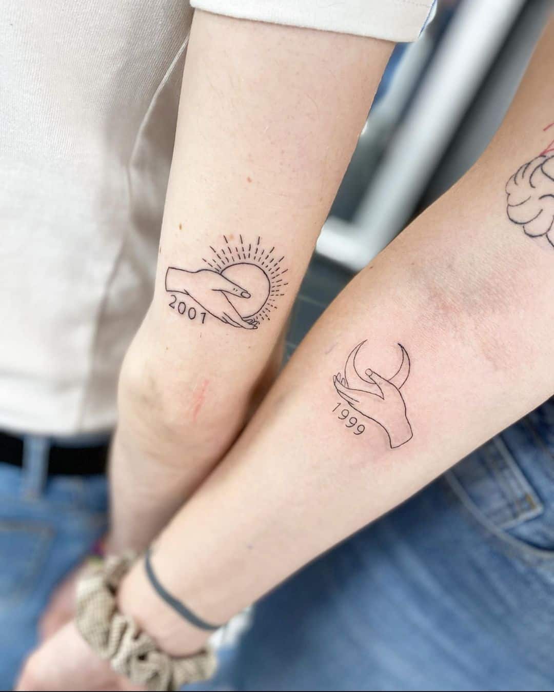 Sun and moon tattoos for BFFs