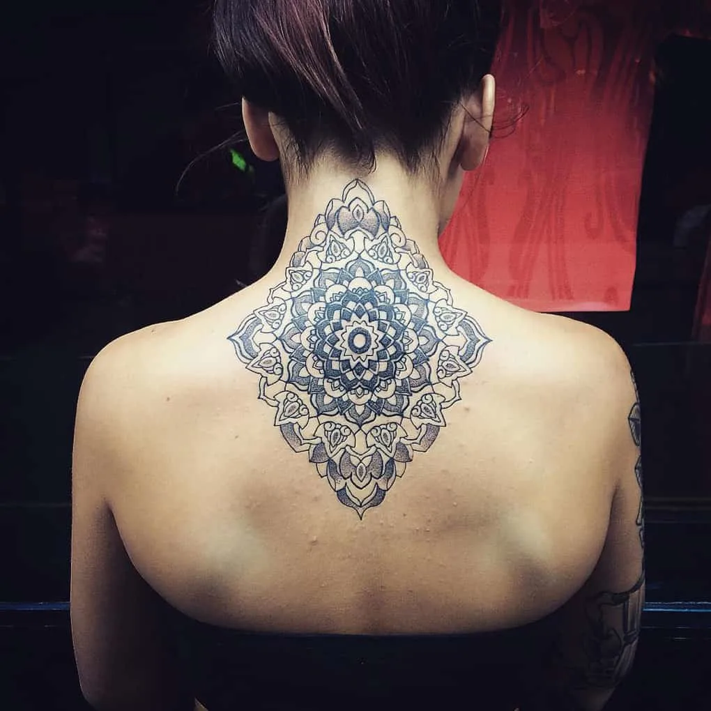 Vertical mandala tattoo