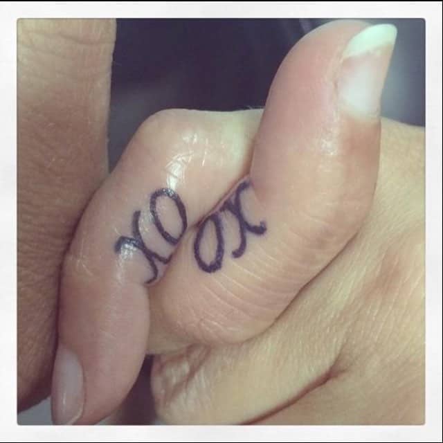 XoXo finger tattoo for female best friends