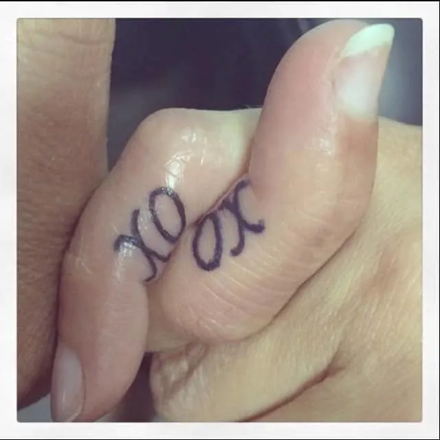 XoXo finger tattoo for female best friends