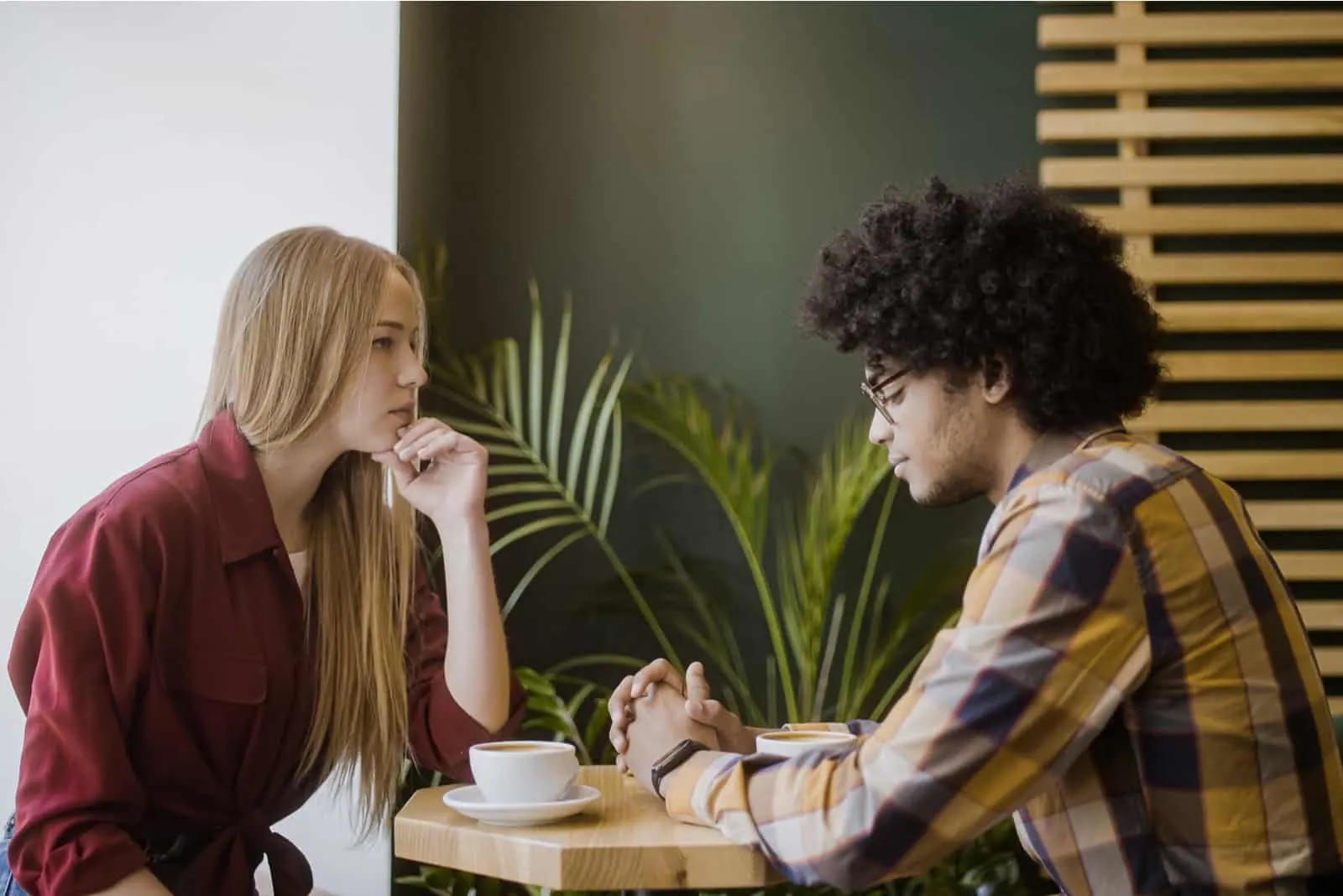 man and woman having a vulnerable conversation