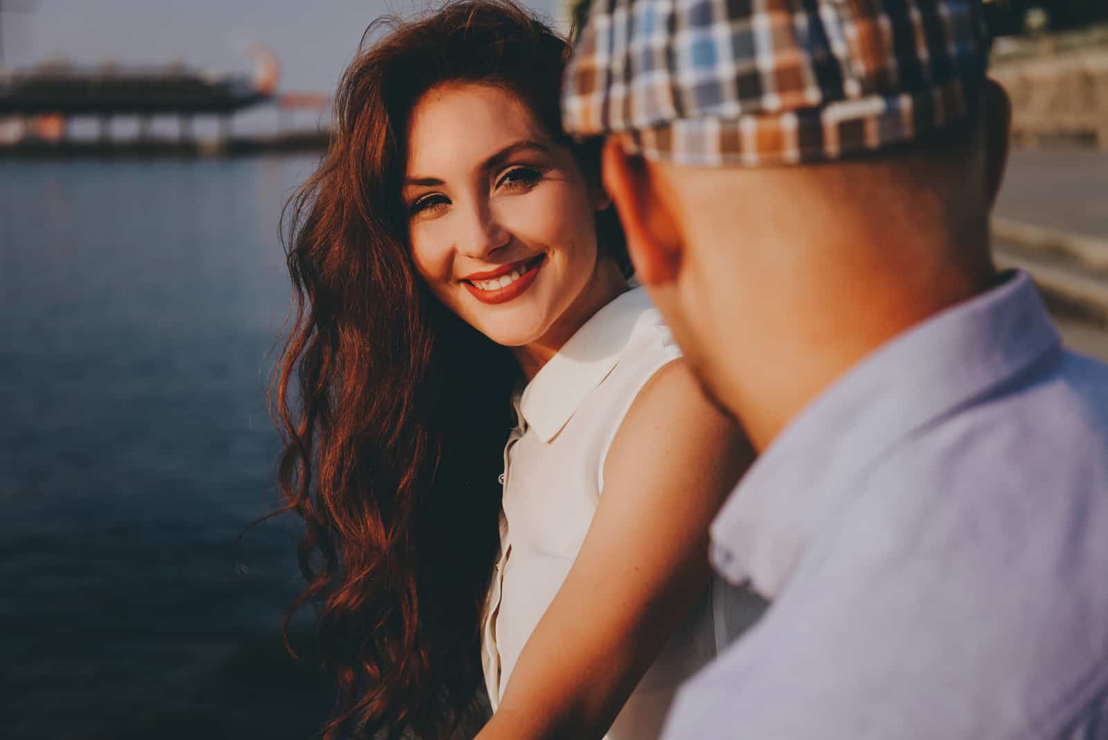 man and woman stare at each other