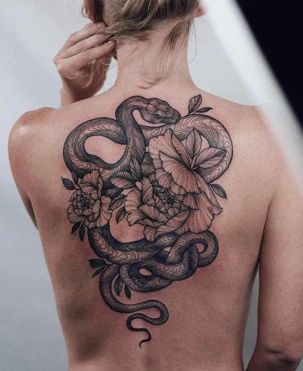 Snake floral tattoo