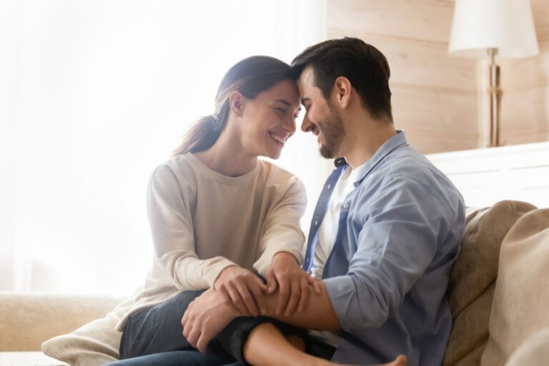 lovely couple sitting on the couch