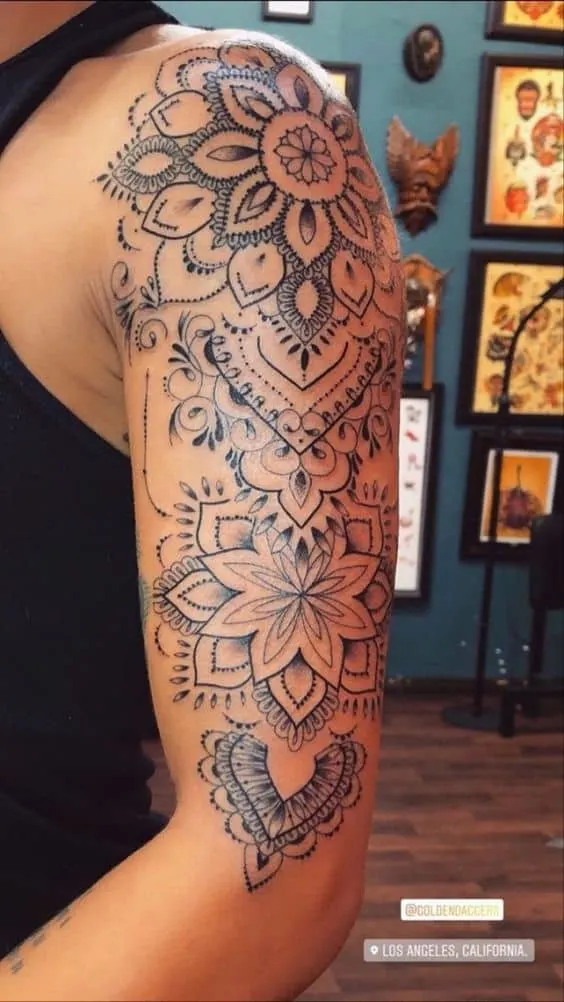Half-sleeve mandala tattoo