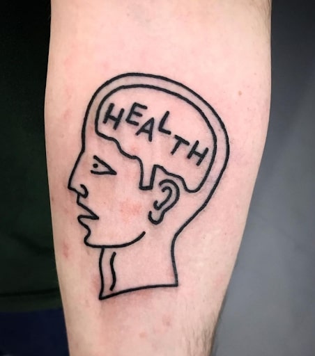 Health written on a brain tattoo 