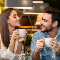 couple having coffee and talking