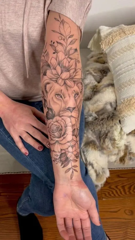Lioness forearm tattoo