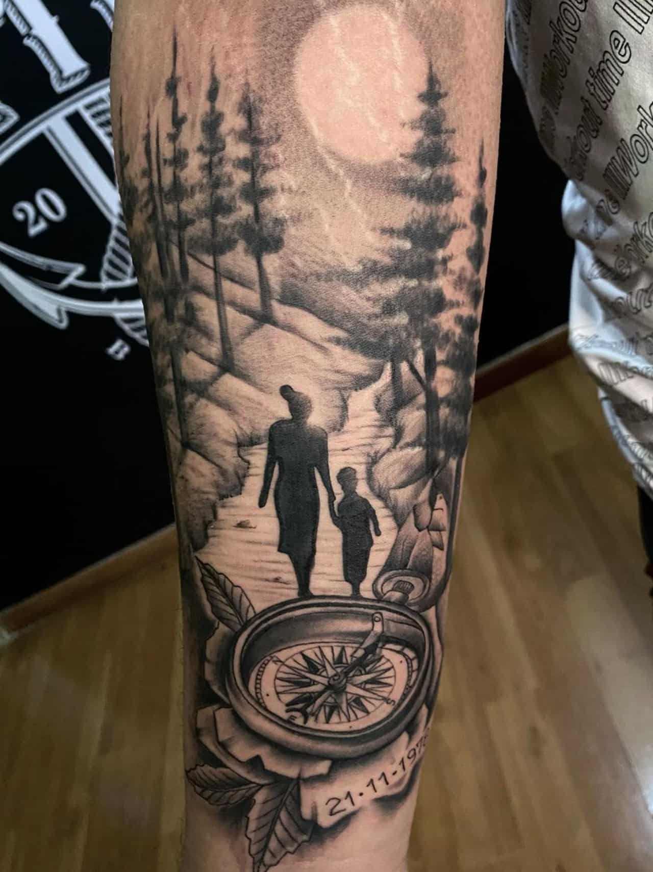 Mom and son walking into the night tattoo