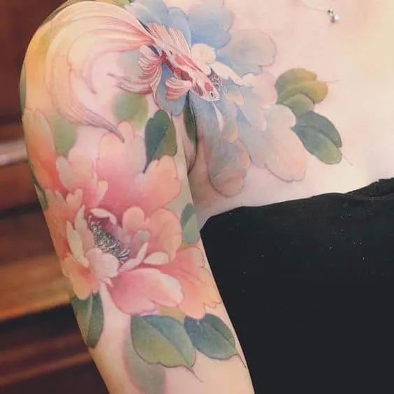 Pastel watercolor half-sleeve tattoos for women