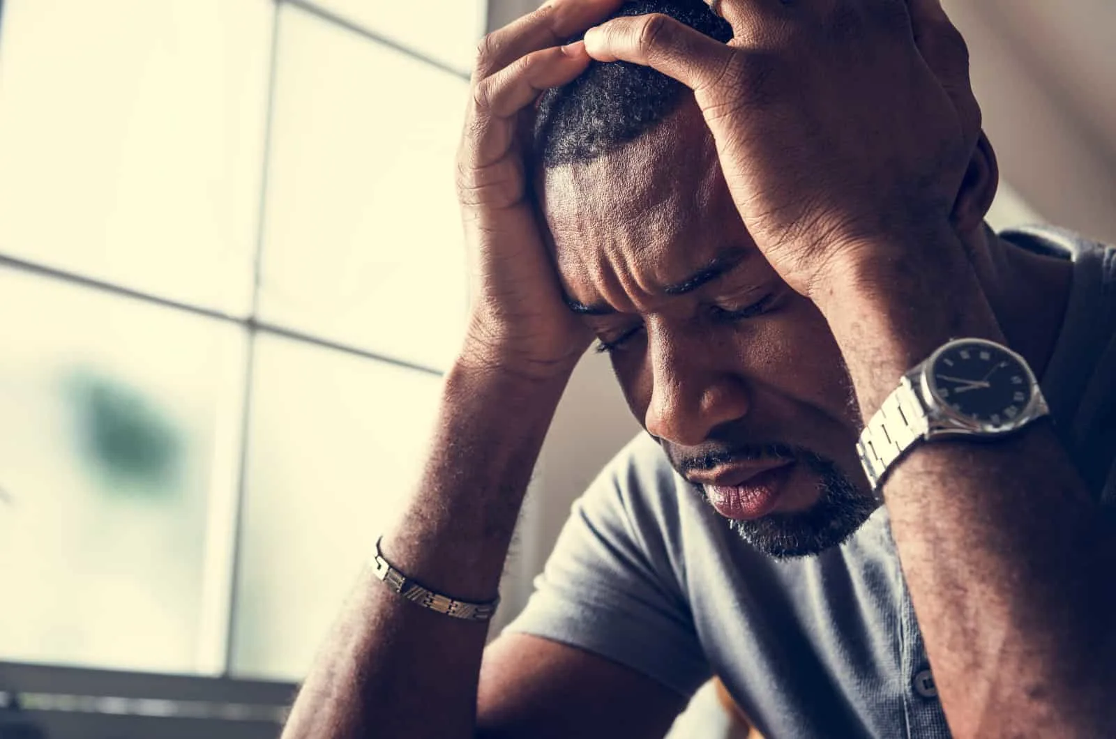 man feeling depressed which is a sexless marriage effect on husband