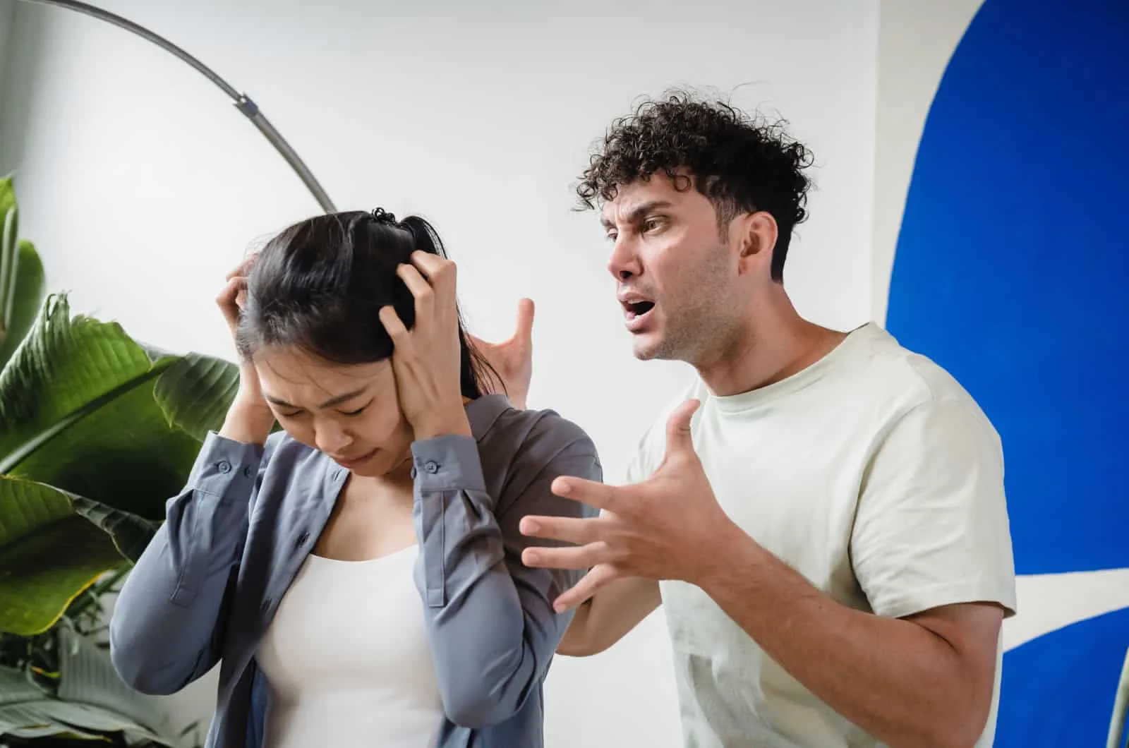 woman afraid of man's uncontrolled anger