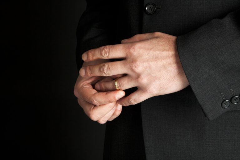 married man takes off wedding ring