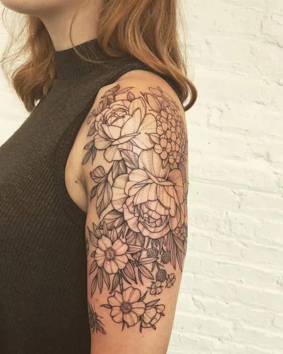 Arm flower tattoo