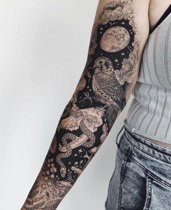 Cool sleeve tattoo on women